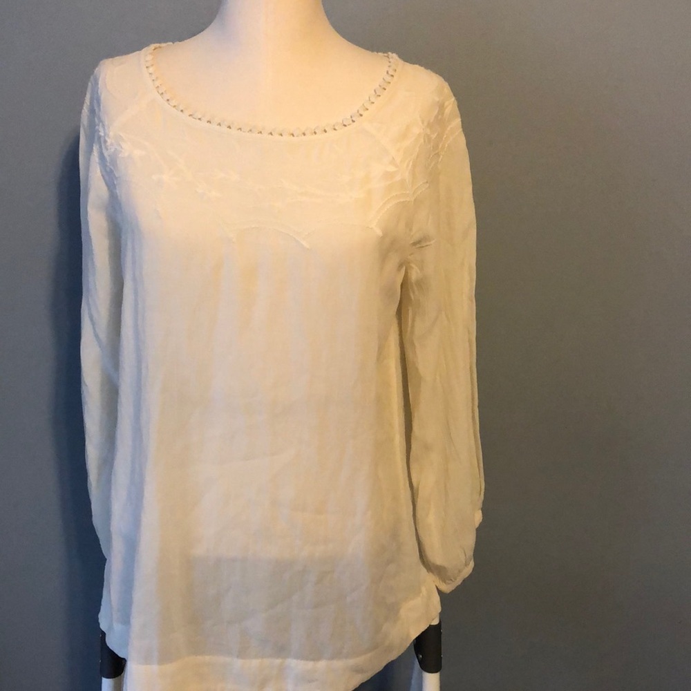 Loft top. It has an embroidered detail around neck
